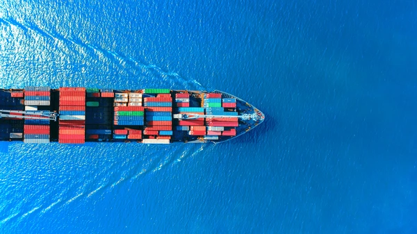 aerial top view container ship that is powered by it support